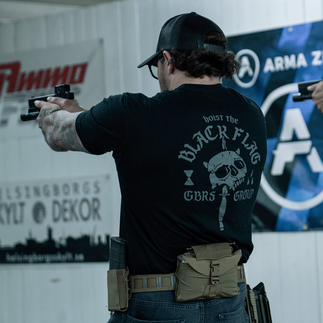 GBRS Group No Quarter Short Sleeve Shirt - Lifestyle shot at a range showing the grey backprint design