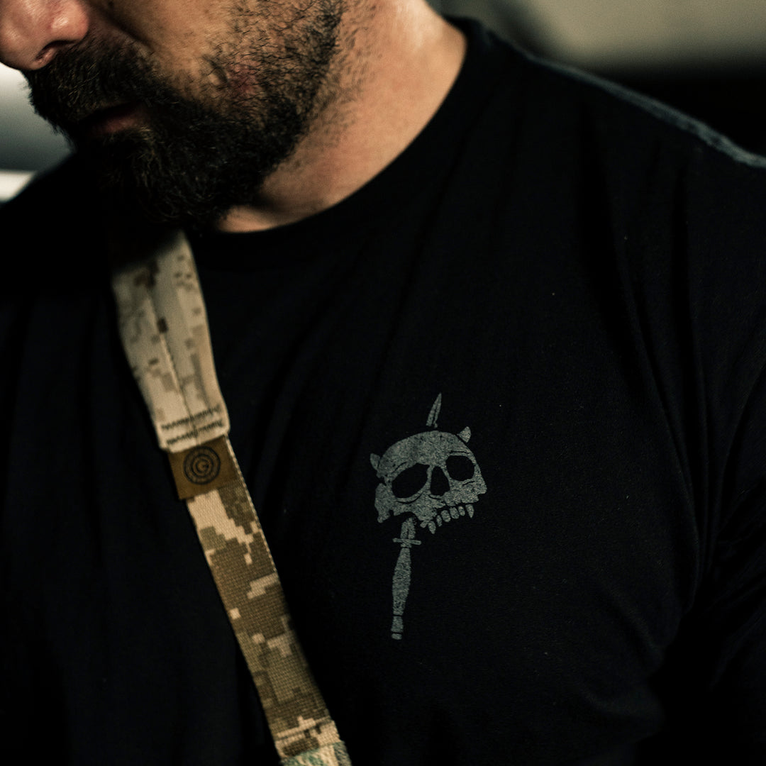 GBRS Group No Quarter Short Sleeve Shirt - Lifestyle shot at a range showing the grey front left chest design detail