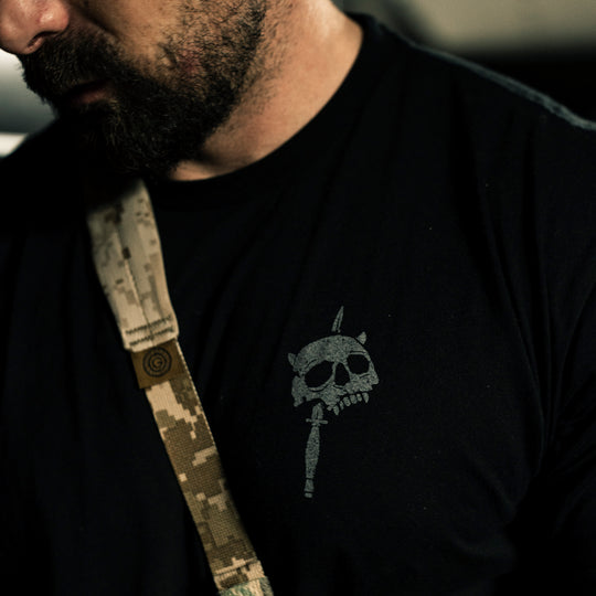 GBRS Group No Quarter Short Sleeve Shirt - Lifestyle shot at a range showing the grey front left chest design detail