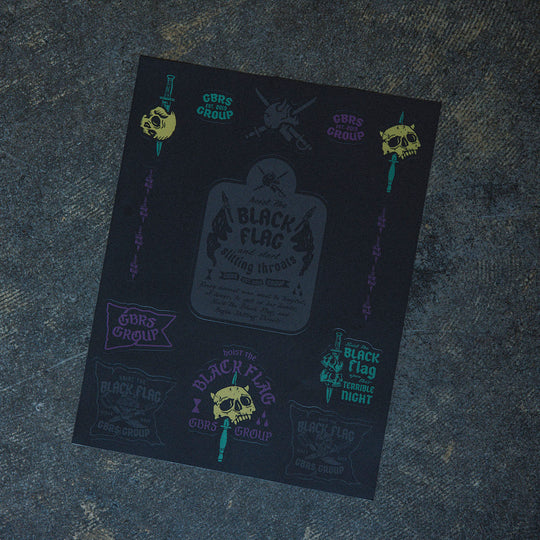 GBRS Group Black Flag Sticker Sheet - Pictured on cement surface showing entire sheet.