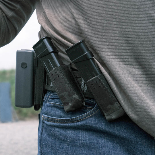 The GBRS Group Single Pistol Magazine Pouch is a versatile, collapsible magazine pouch. Allows for vertical or 45 degree mounting, and can be used with or without the bungee retention cord and pull tab, based on user preference.