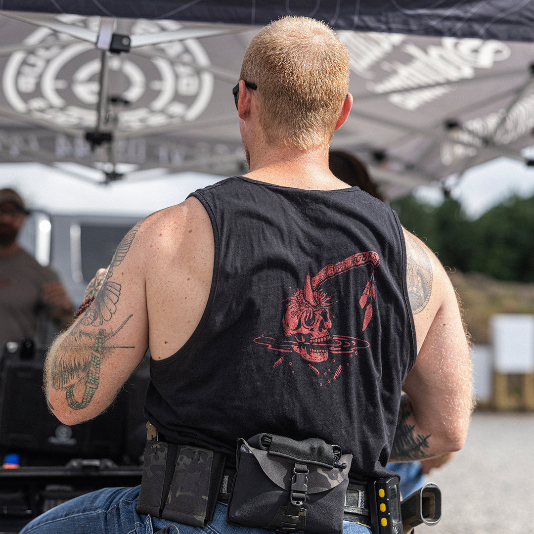 GBRS Group War Crimes Tank- lifestyle shot at a range picturing Back of tank on a male
